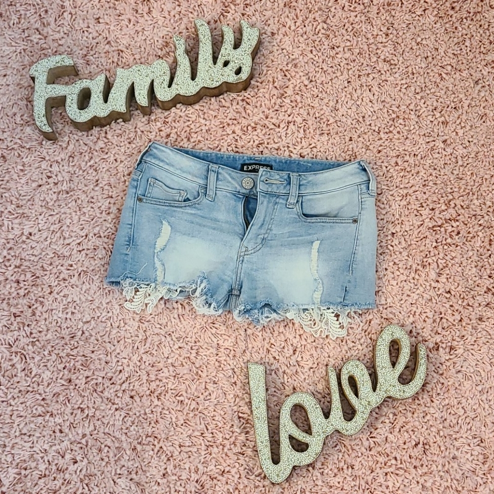 Express shortie low-rised destroyed jean shorts.
